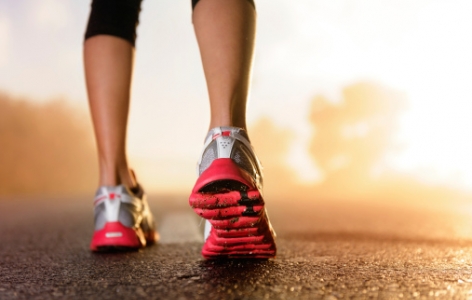 Runner's feet as she gets ready to begin a race