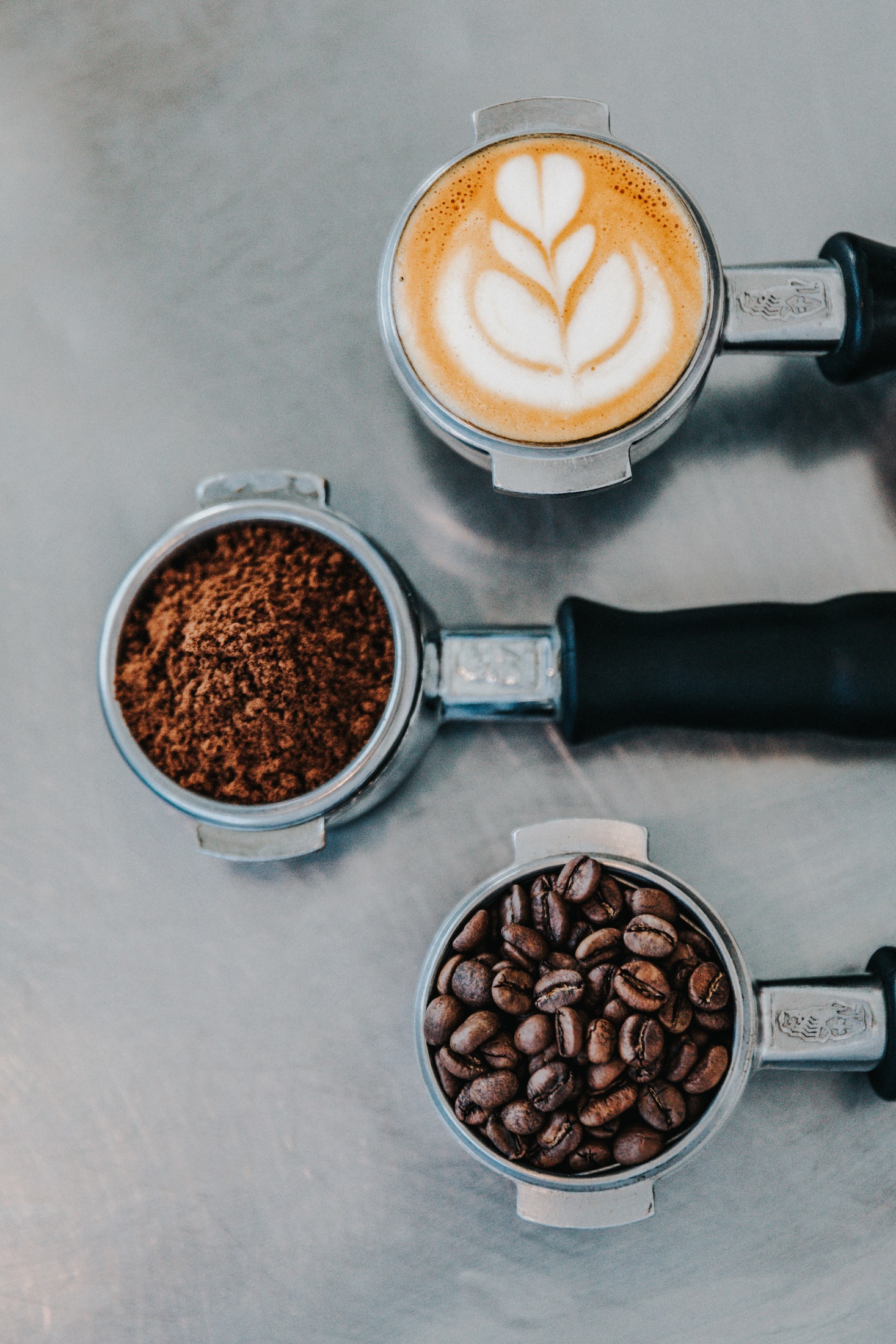 Coffee beans and coffee with white foam