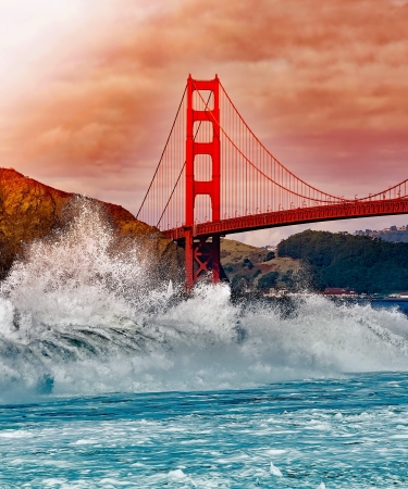 Golden Gate Bridge with Water Splashing on Rocks