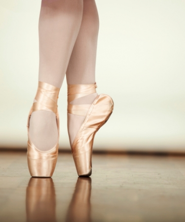 A ballet dancer's feet on pointe