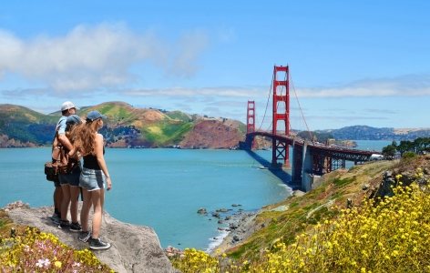 Woman overlooking the San Francisco Bay and the Golden Gate Bridge