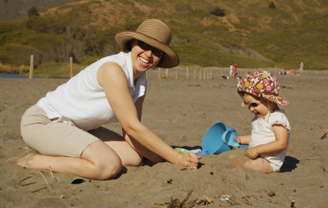Mother and child playing on a San Francisco beach