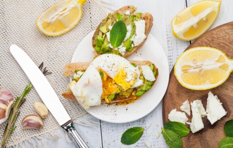 A healthy breakfast of eggs and avocado toast